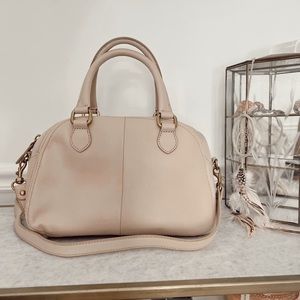 J.Crew blush pink pebbles leather purse with flat gold detailing.